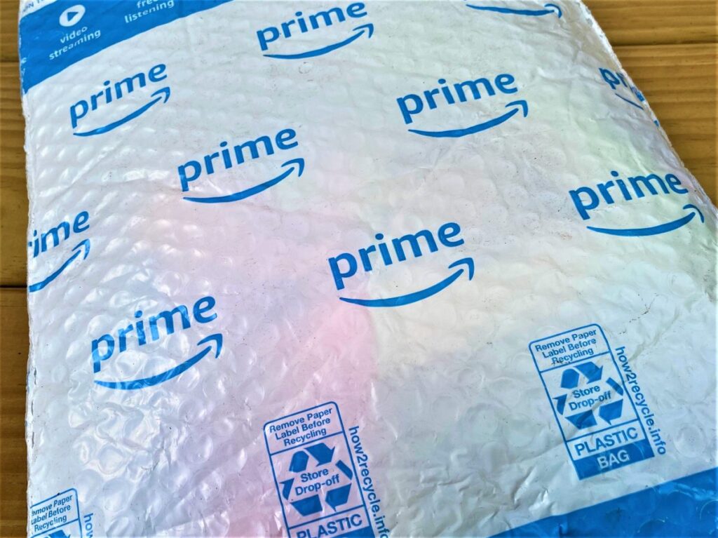 <i>Photo Credit: Emily Petsko</i> A blue and white Amazon plastic padded bag